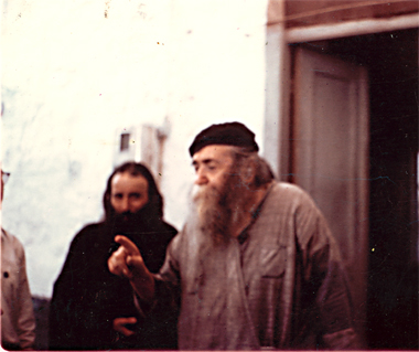 Father Ieronymos, with Father Panteliemon weeping in the background.
