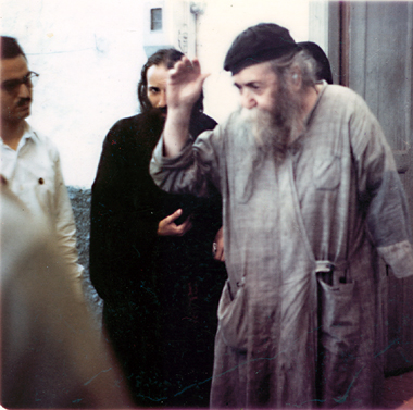 Father Ieronymos, with Father Panteliemon weeping in the background.